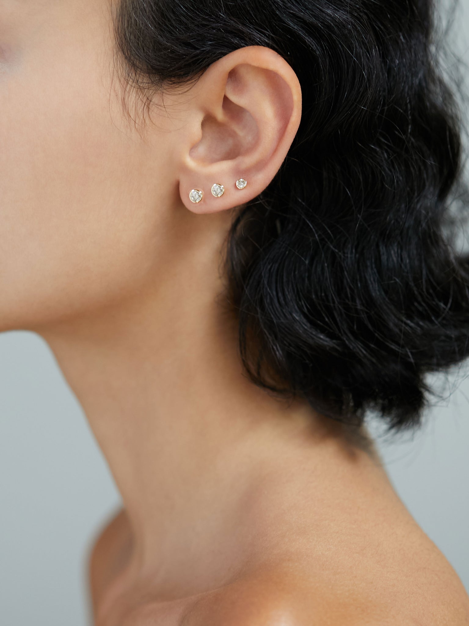 10KT DIAMOND 4MM SINGLE STUD EARRING